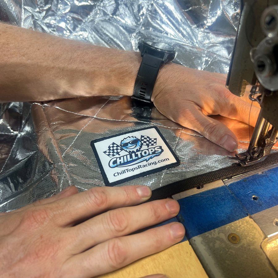 CHILLTOPS logo patch being sewn onto cover